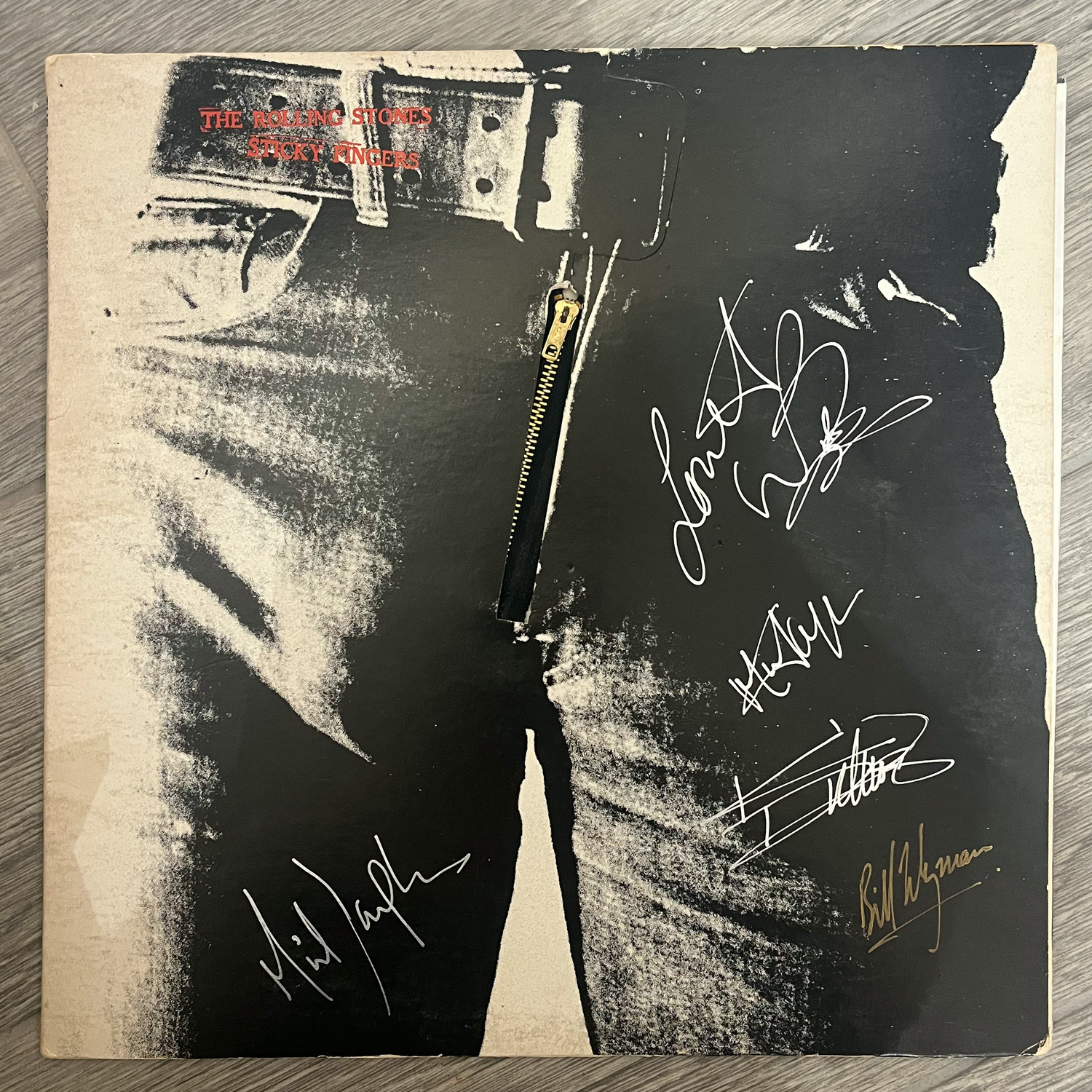 The Rolling Stones Sticky Fingers Original Album designed by Andy Warhol and Hand Signed by Band
